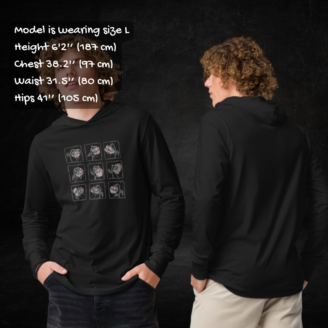 Person wearing a black Hooded Long-Sleeve Bella Canvas 3512 tee with a grid of crying emo flowers in soft pink