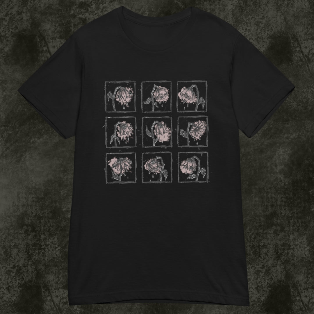 a black Gildan 64000L semi fitted women's tee with a grid of crying wilting flowers with soft pink details