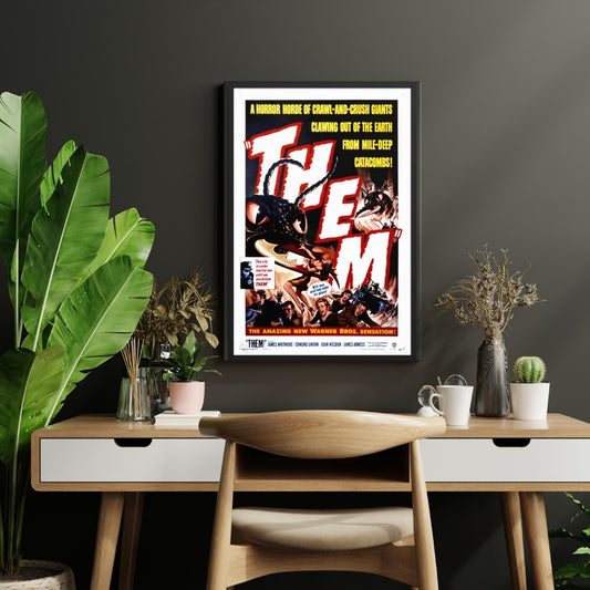 a framed poster of the vintage horror movie them! on a wall