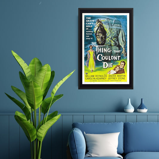 framed poster of a vintage horror movie the thing that couldn't die on a wall