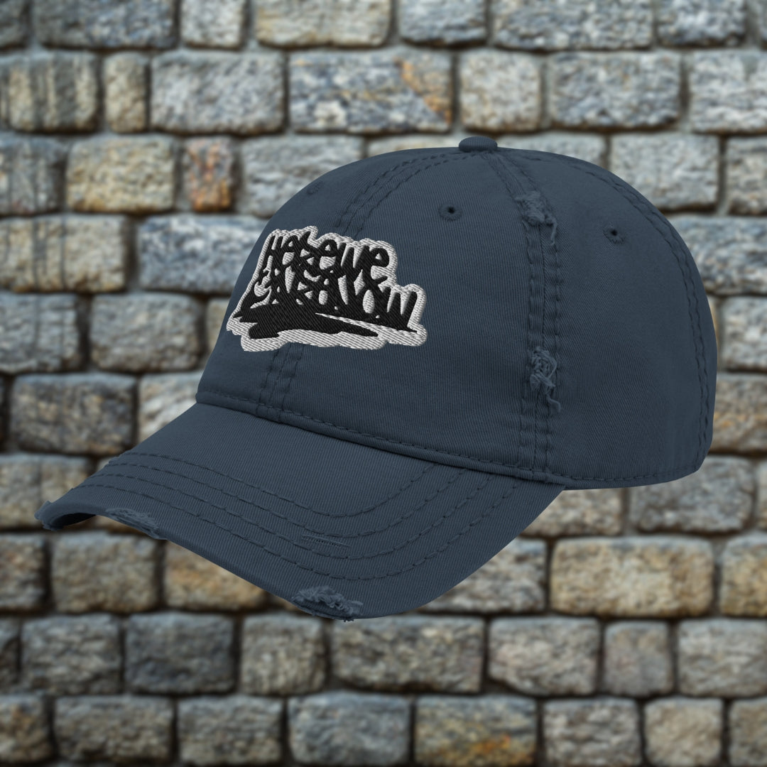 Navy distressed otto cap with grunge quote embroidery "here we are now"