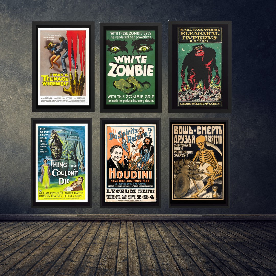 Collection of vintage framed posters of horror movies and skeletons