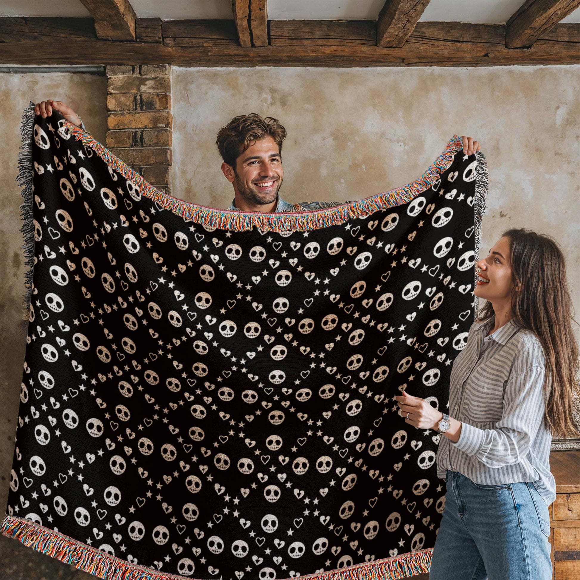 woven blanket with a geometric pattern of stitch mouth skulls