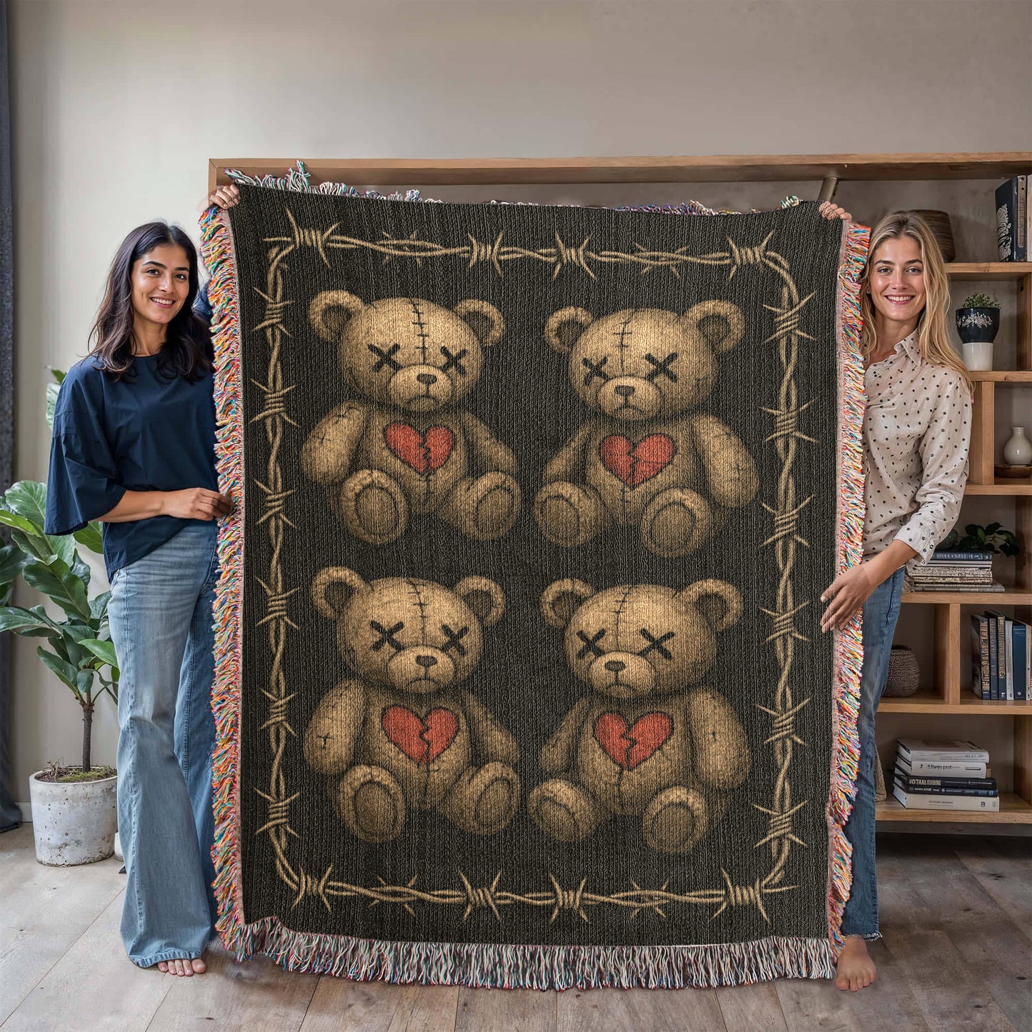 a woven blanket with x-eyed teddy bears on a dark background and surrounded by a frame of barbed wire