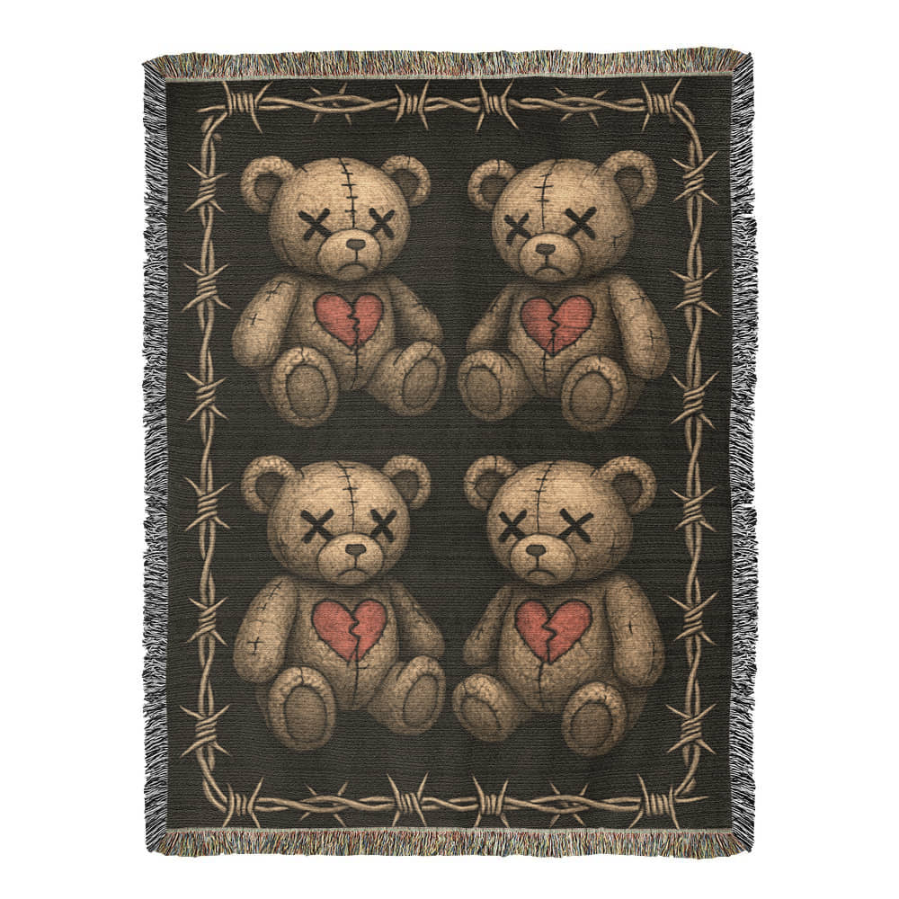 a woven blanket with x-eyed teddy bears on a dark background and surrounded by a frame of barbed wire