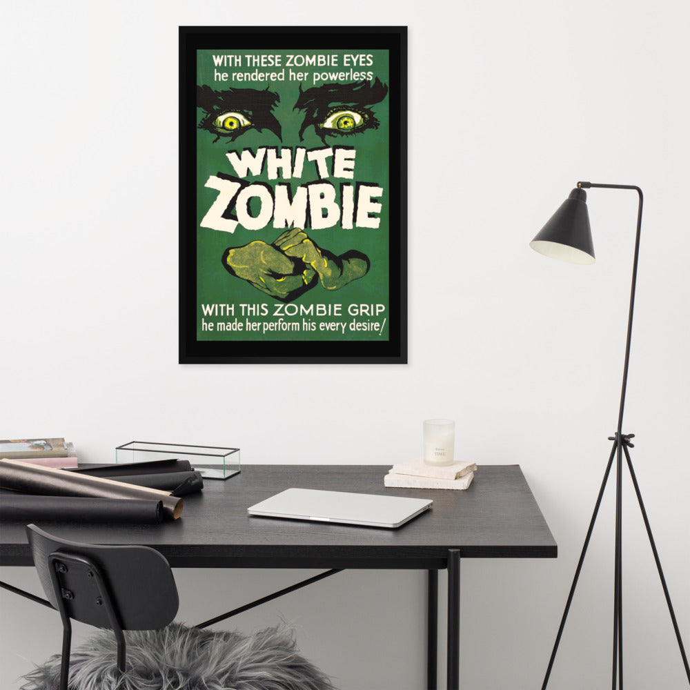 a desk and a framed poster with a vintage horror movie design, white zombie
