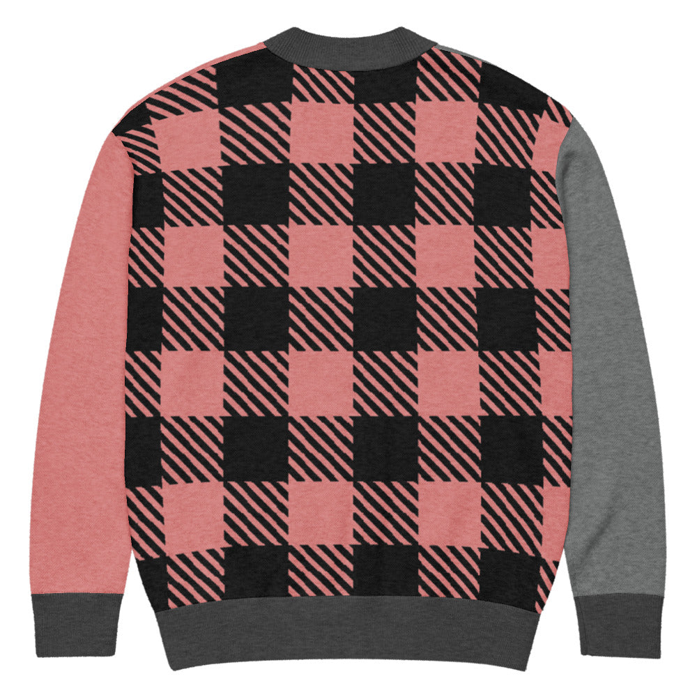 a knitted cardigan with patchwork like design, plaid, hearts, spooky eyes and a cat