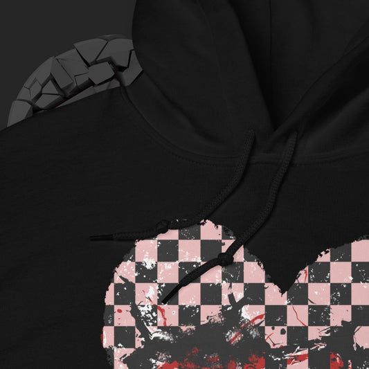 a black hoodie with a pink checkered and distressed heart design