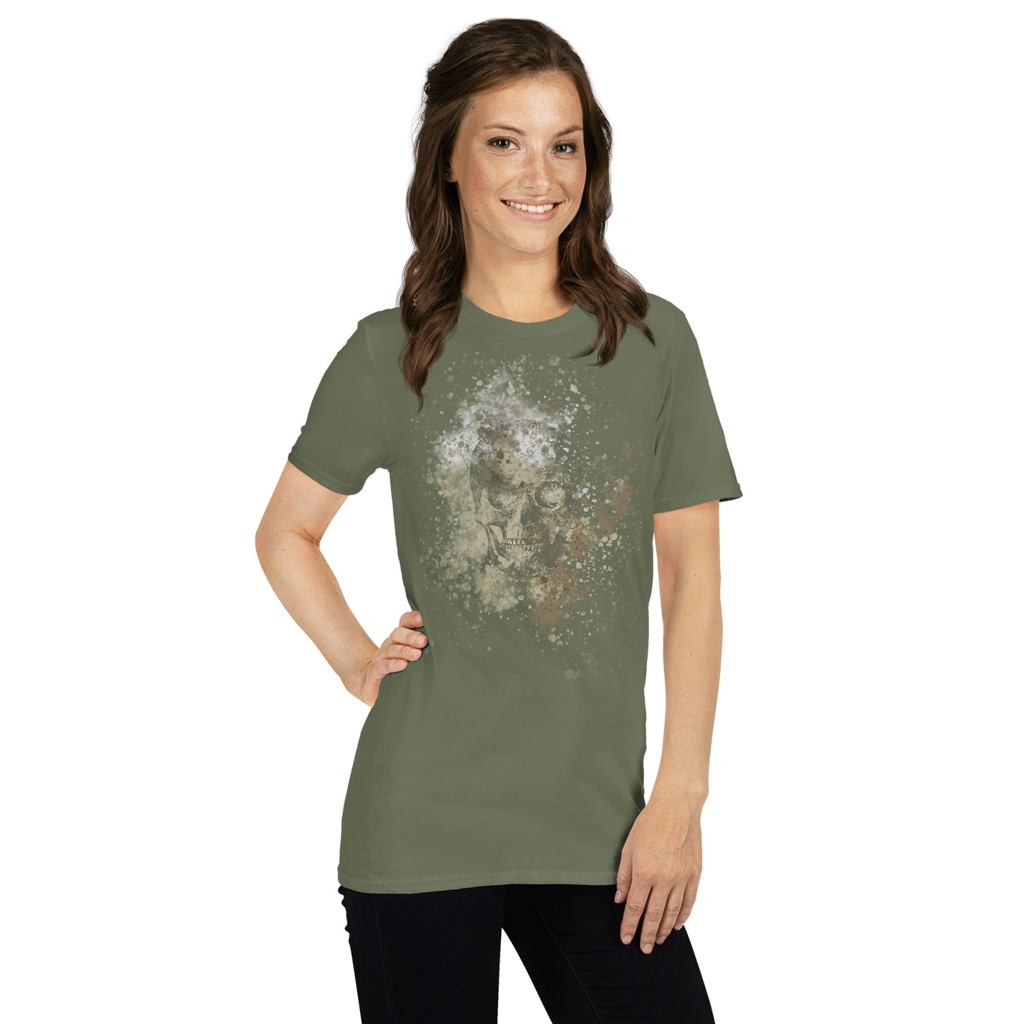 woman wearing a tee with subtle skull graphic surrounded and overlaid with paint splatter in camouflage colors on military green