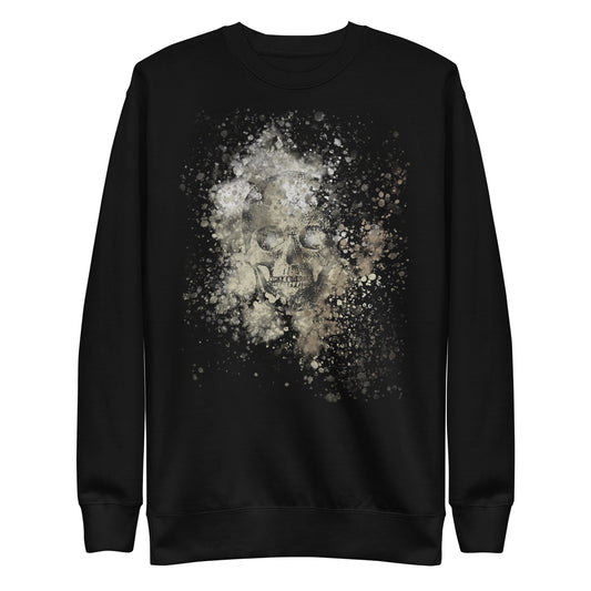front of a sweatshirt with subtle skull graphic surrounded and overlaid with paint splatter in camouflage colors on black
