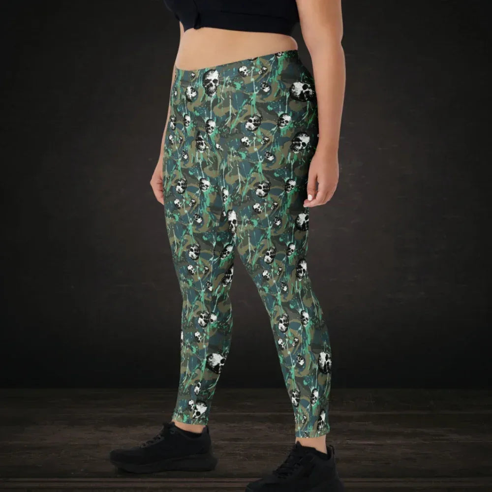 Person wearing leggings with green camo splatter skull pattern
