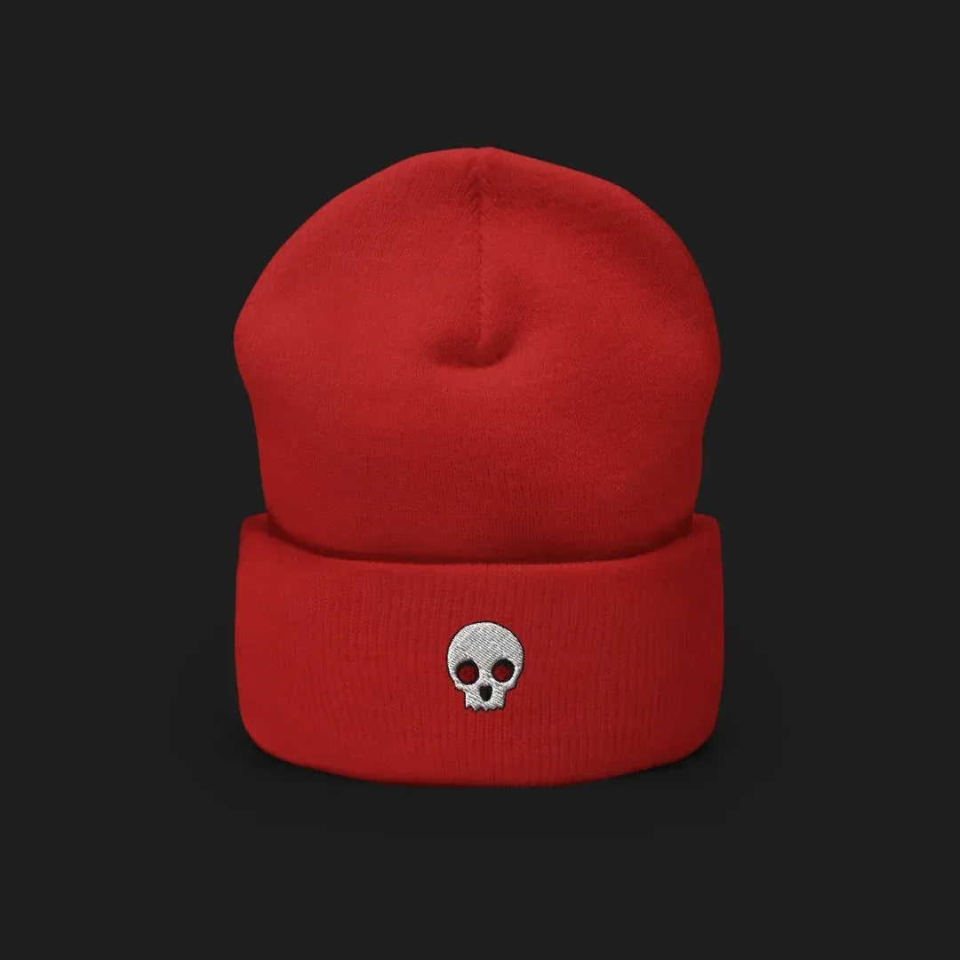 A cuffed beanie with a clean minimalistic skull embroidery