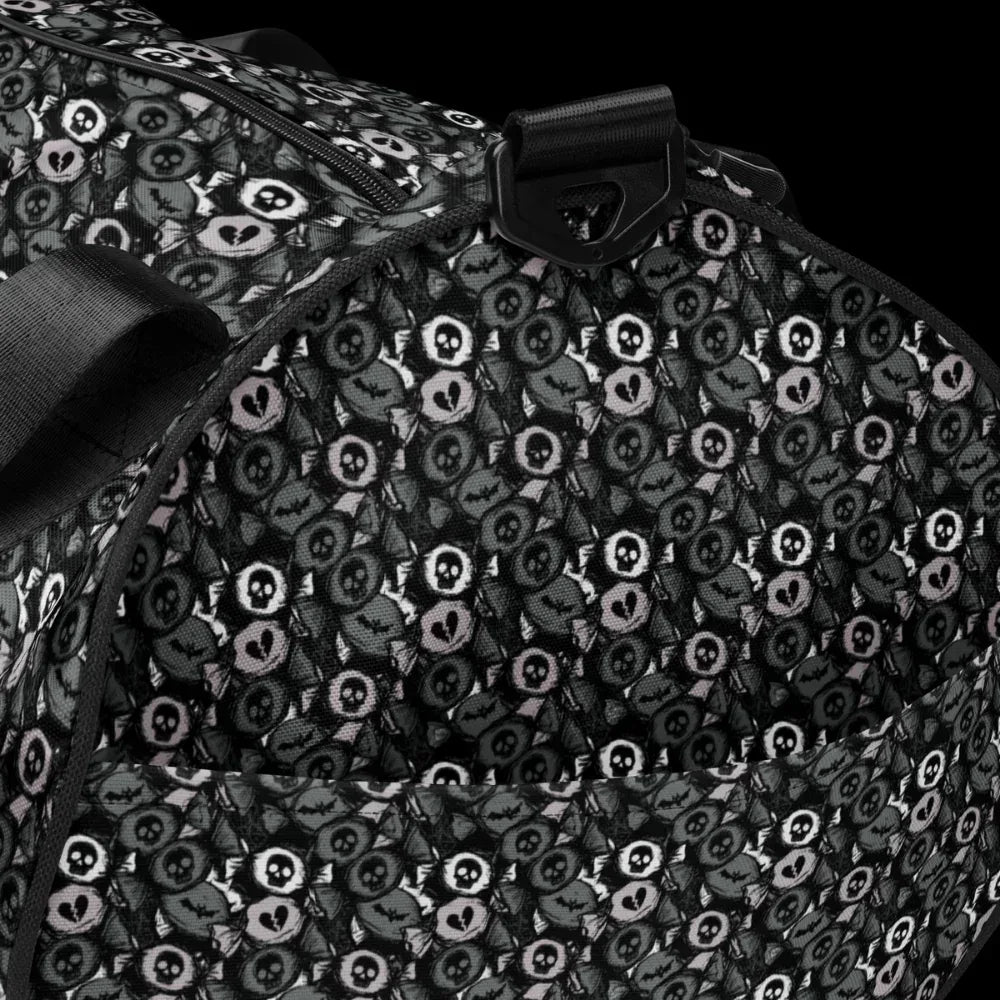 Duffel bag with a skull candy pattern in grey shades