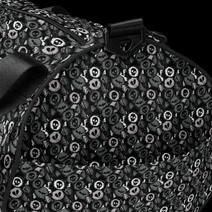 Duffel bag with a skull candy pattern in grey shades
