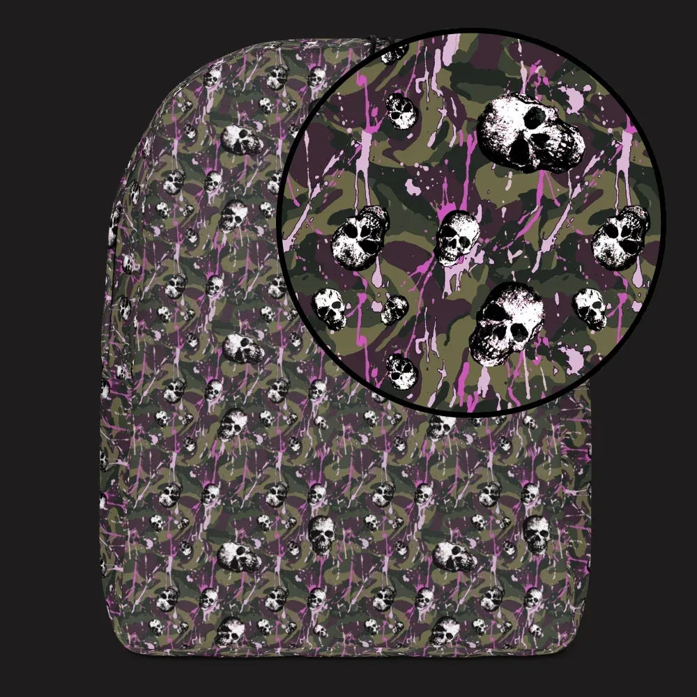 a backpack with a camo and paint and gritty skulls pattern in camo and purple