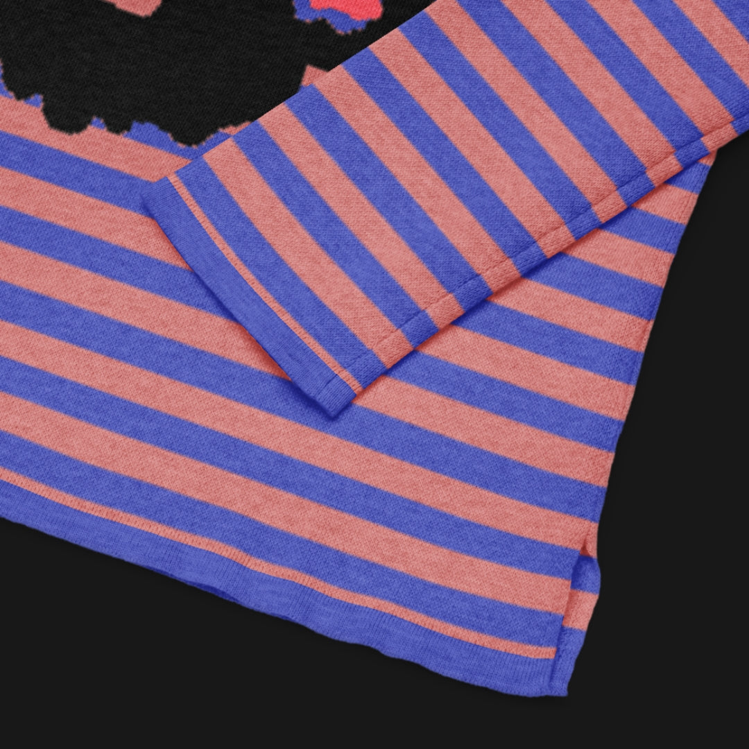 Pink and blue striped sweater with a large x-eyed skull design