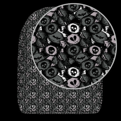 a backpack with an alt emo skull candy pattern in grey shades