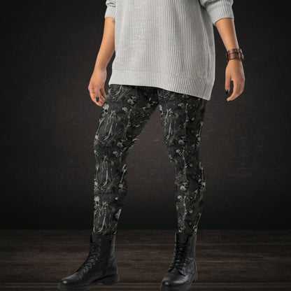 Person wearing leggings with grey camo splatter skull pattern