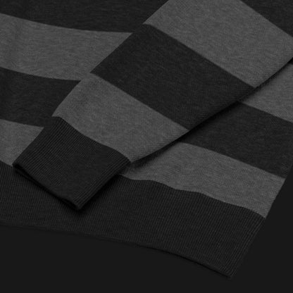 a grunge striped sweater with wide black and dark stripes