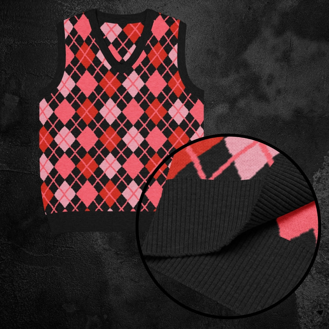 Knitted sweatshirt vest with strawberry red and black argyle pattern on a dark background
