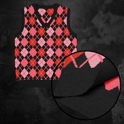 Knitted sweatshirt vest with strawberry red and black argyle pattern on a dark background