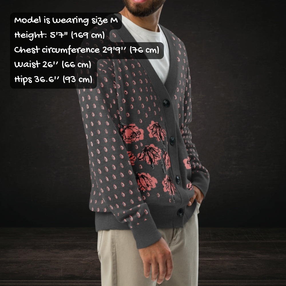 Person wearing an emotional grey knitted cardigan with tears and crying flowers with sizing info