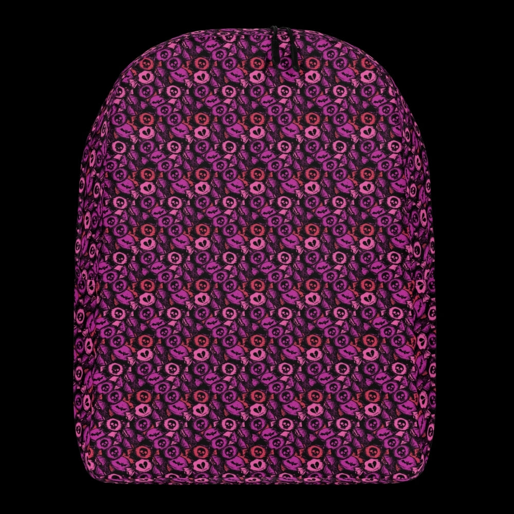a backpack with an alt emo skull candy pattern in purple pink and red