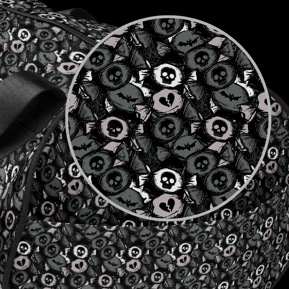 Duffel bag with a skull candy pattern in grey shades