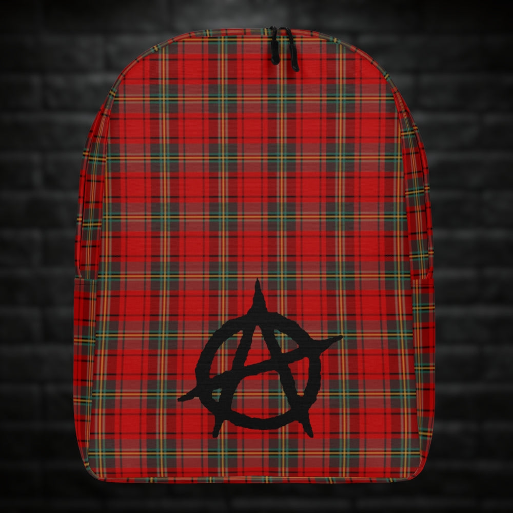 A backpack with classic red punk tartan print and an anarchy symbol