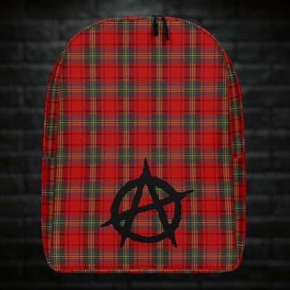 A backpack with classic red punk tartan print and an anarchy symbol