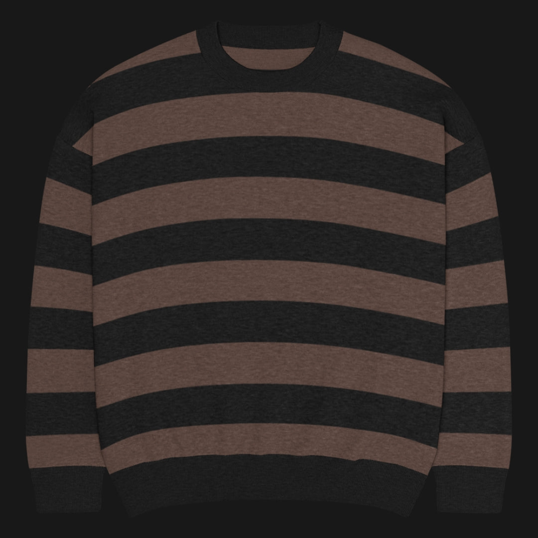 a grunge striped sweater with wide black and dark stripes