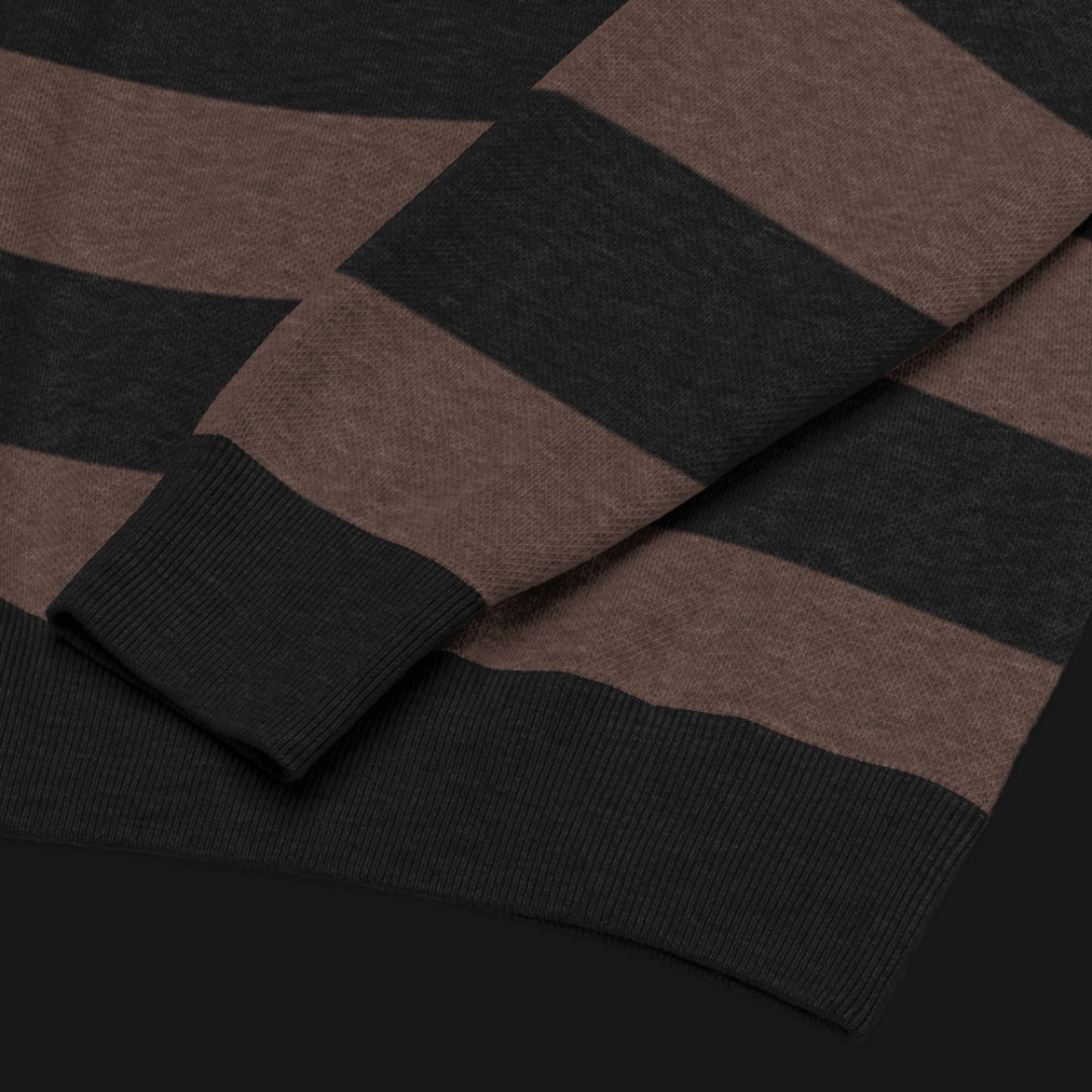 a grunge striped sweater with wide black and dark stripes