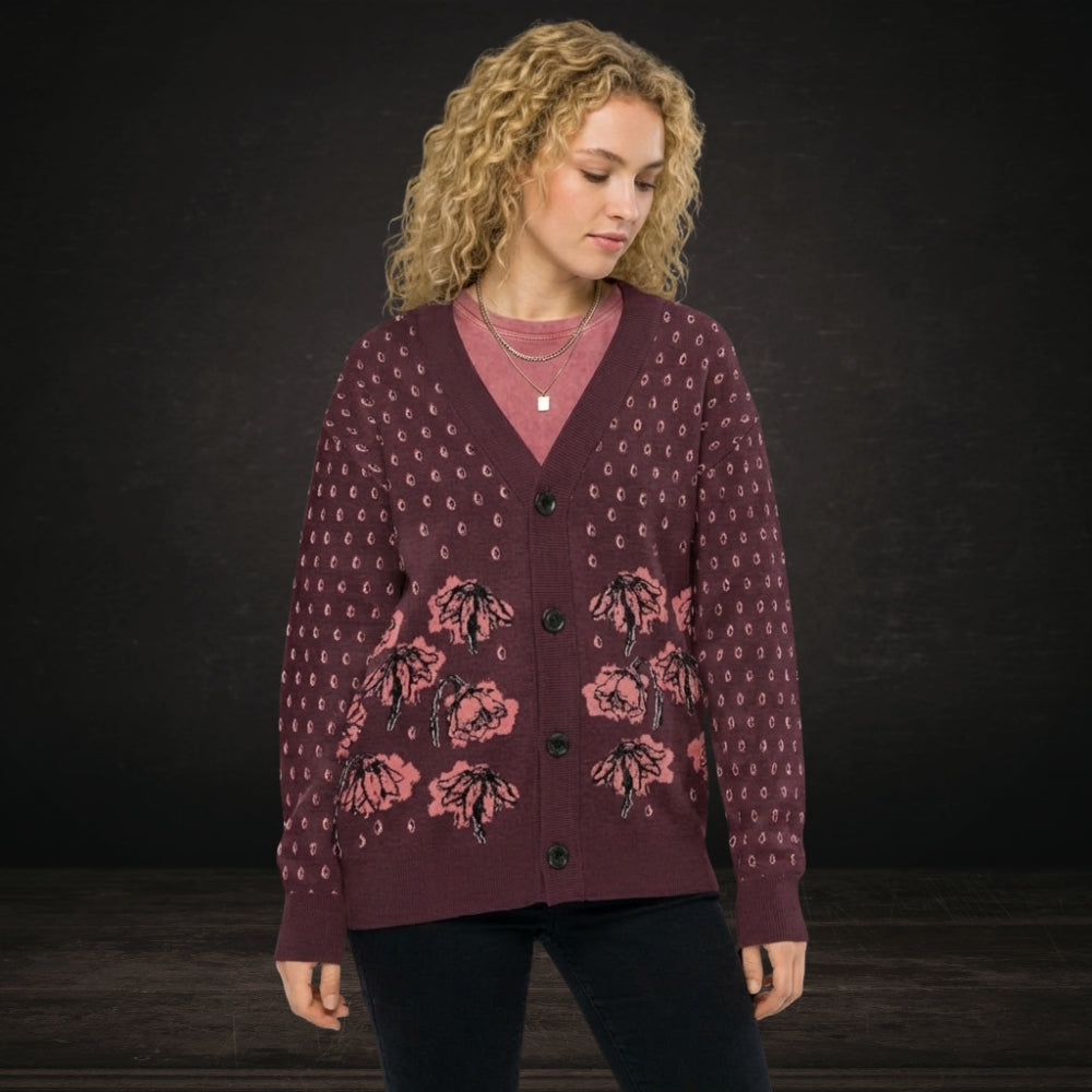 Person wearing an emotional burgundy knitted cardigan with tears and crying flowers