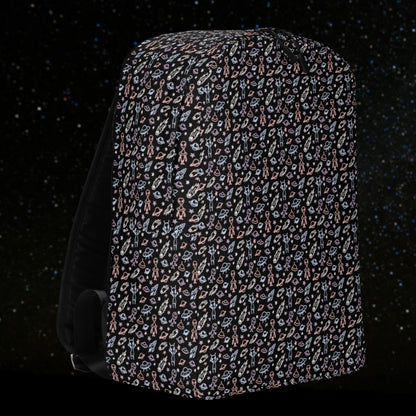 backpack with a hand drawn space pattern featuring scattered confused aliens, planets, comets, and UFOs in pastel on black. 