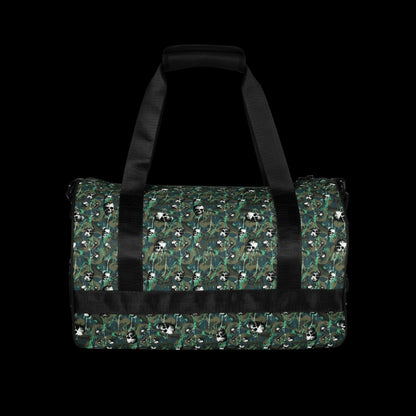 a duffel gym bag with a camo, paint splatter, and gritty skulls pattern in camo and teal shades