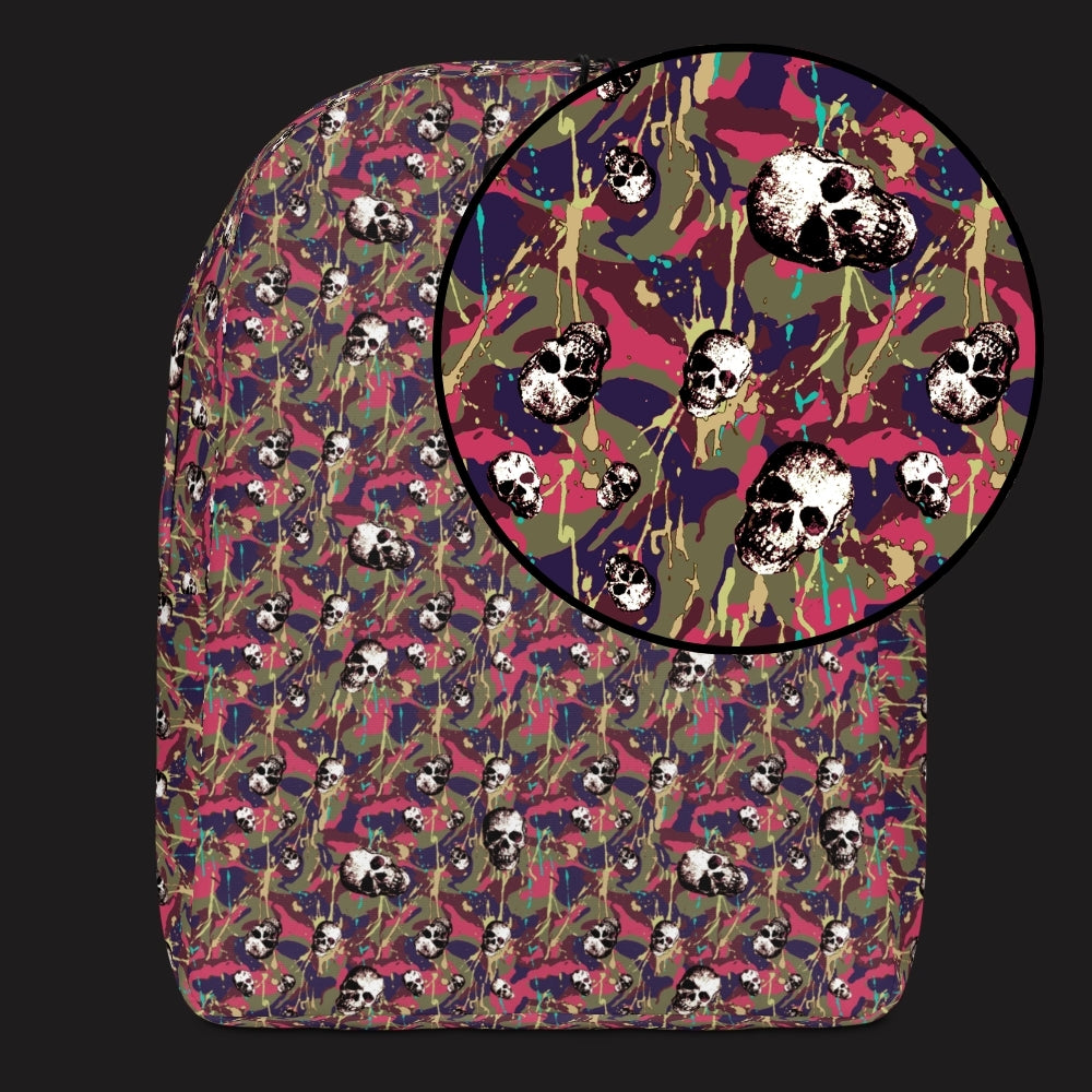 a backpack with a camo and paint and gritty skulls pattern in pink and blue brown
