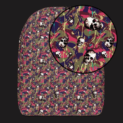 a backpack with a camo and paint and gritty skulls pattern in pink and blue brown