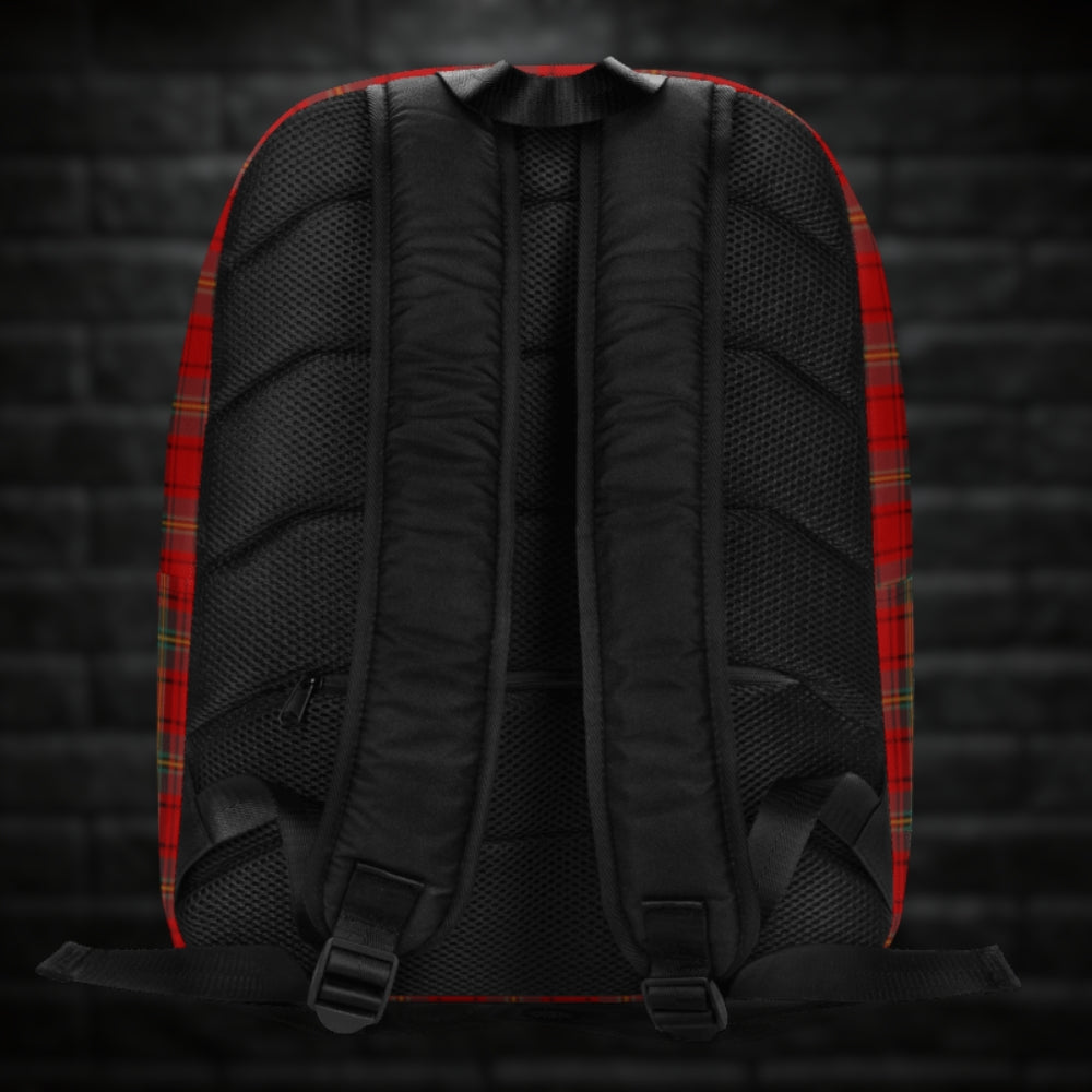 A backpack with classic red punk tartan print