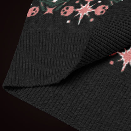 A knit vest with a mysterious eye and skulls pattern in pine green and pink