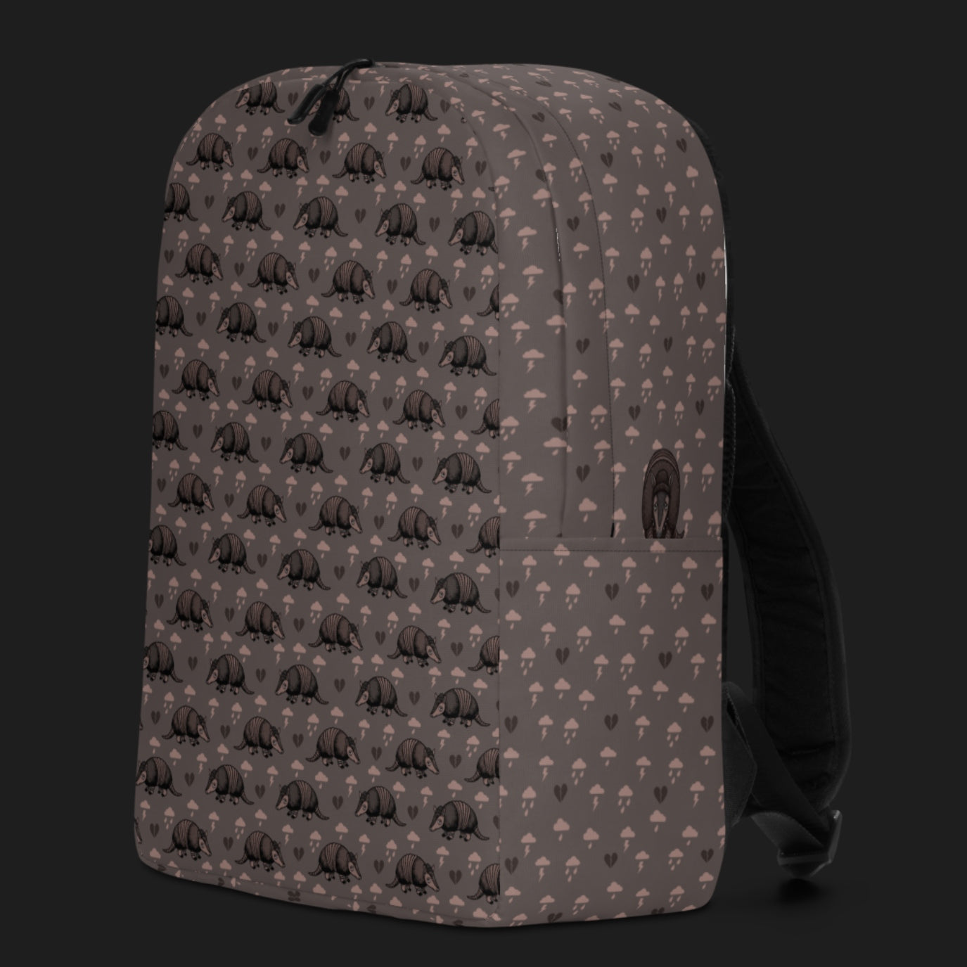 an emo armadillo patterned backpack with broken hearts and storm clouds in dusty pink and grey