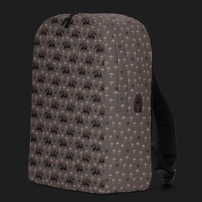 an emo armadillo patterned backpack with broken hearts and storm clouds in dusty pink and grey