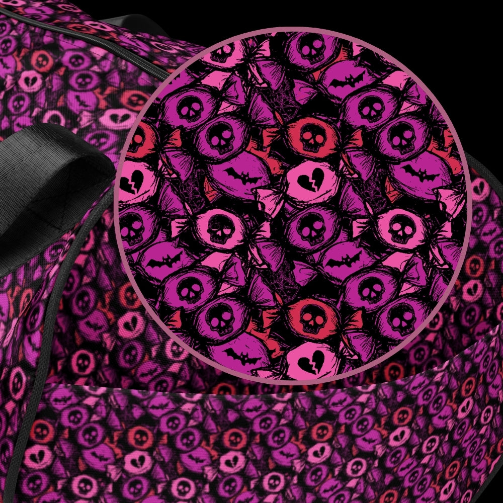 Duffel bag with a skull candy pattern in pink shades