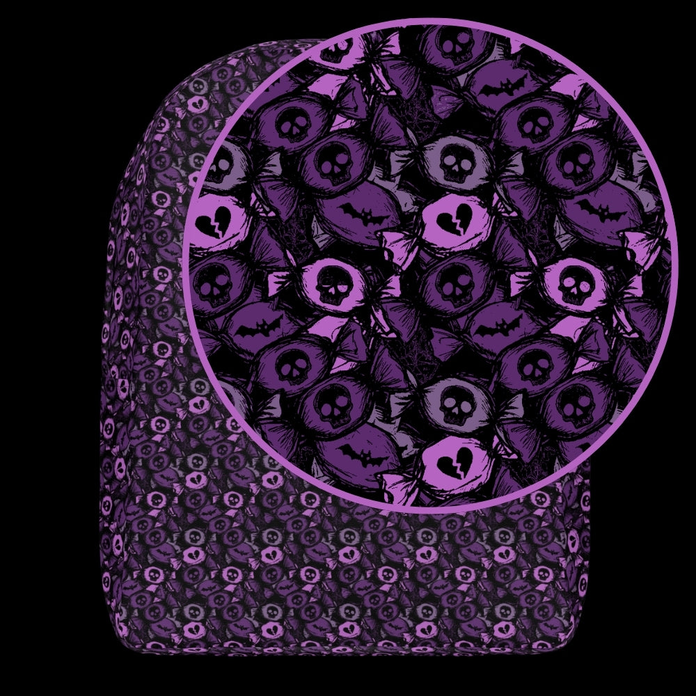 a backpack with an alt emo skull candy pattern in purple shades