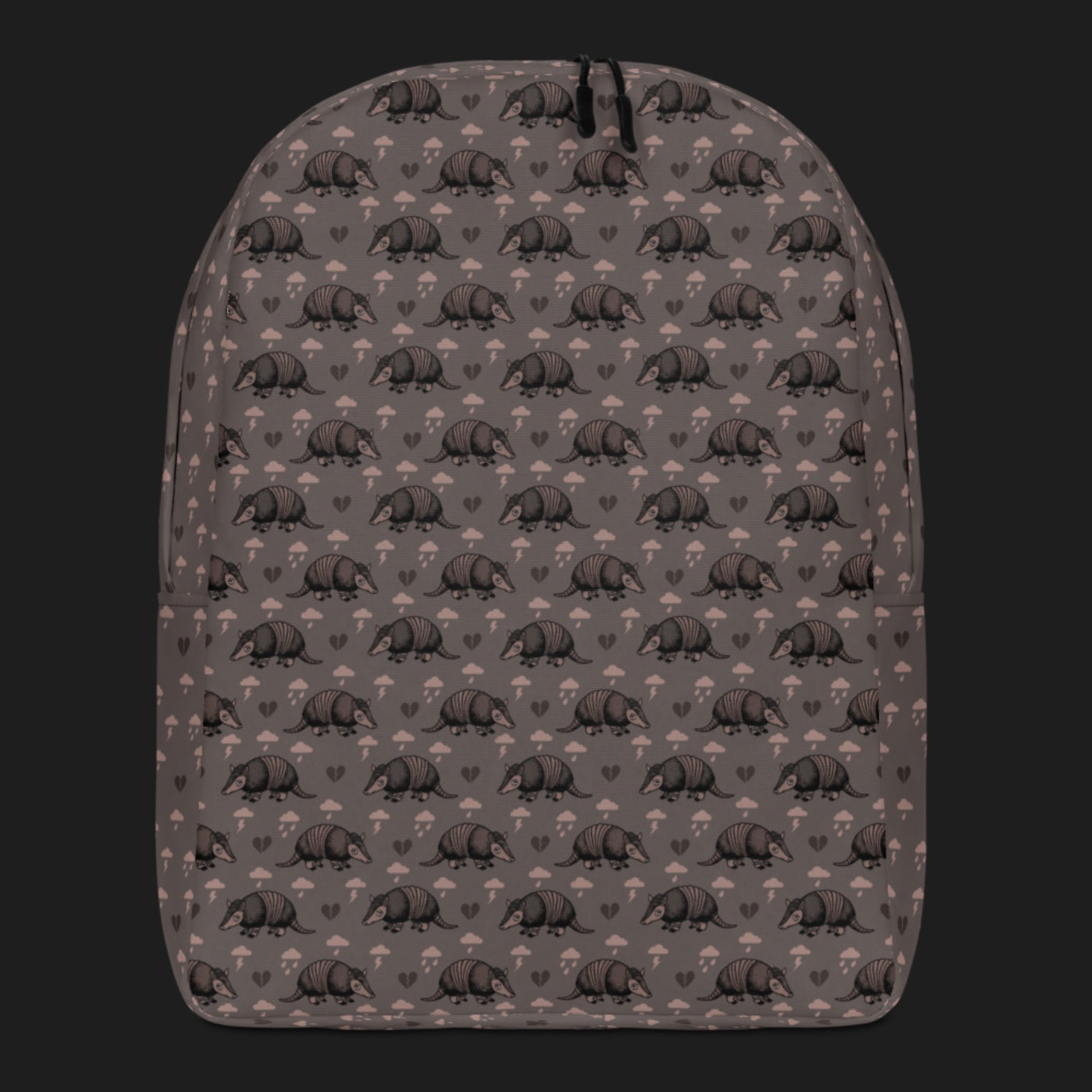 an emo armadillo patterned backpack with broken hearts and storm clouds in dusty pink and grey