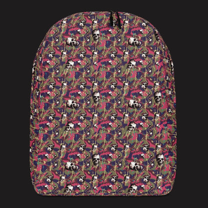 a backpack with a camo and paint and gritty skulls pattern in pink and blue brown