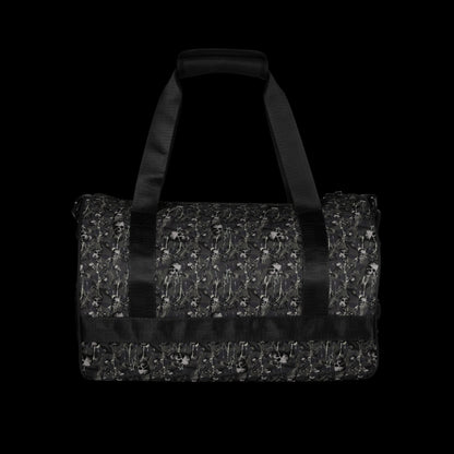 a duffel gym bag with a camo, paint splatter, and gritty skulls pattern in grey camo shades