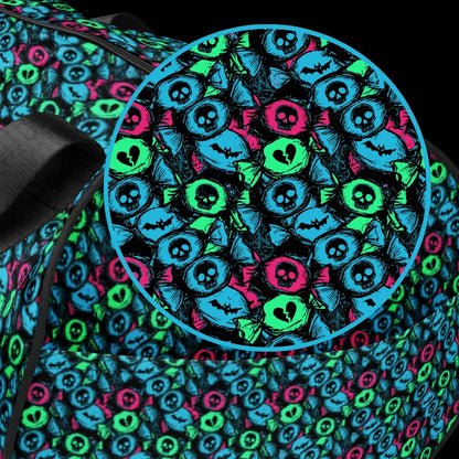 Duffel bag with a skull candy pattern in neon teal green and pink shades