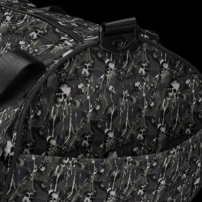 a duffel gym bag with a camo, paint splatter, and gritty skulls pattern in grey camo shades