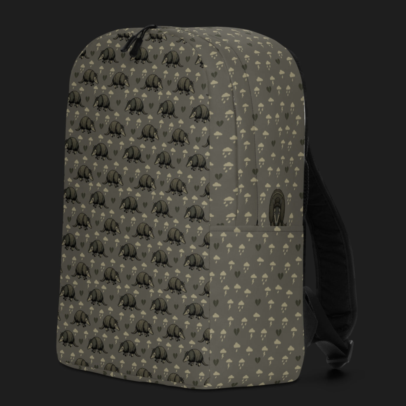 an emo armadillo patterned backpack with broken hearts and storm clouds in brownish grey