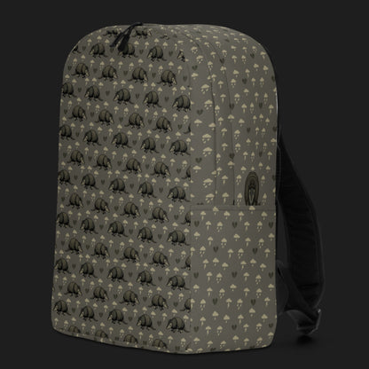 an emo armadillo patterned backpack with broken hearts and storm clouds in brownish grey